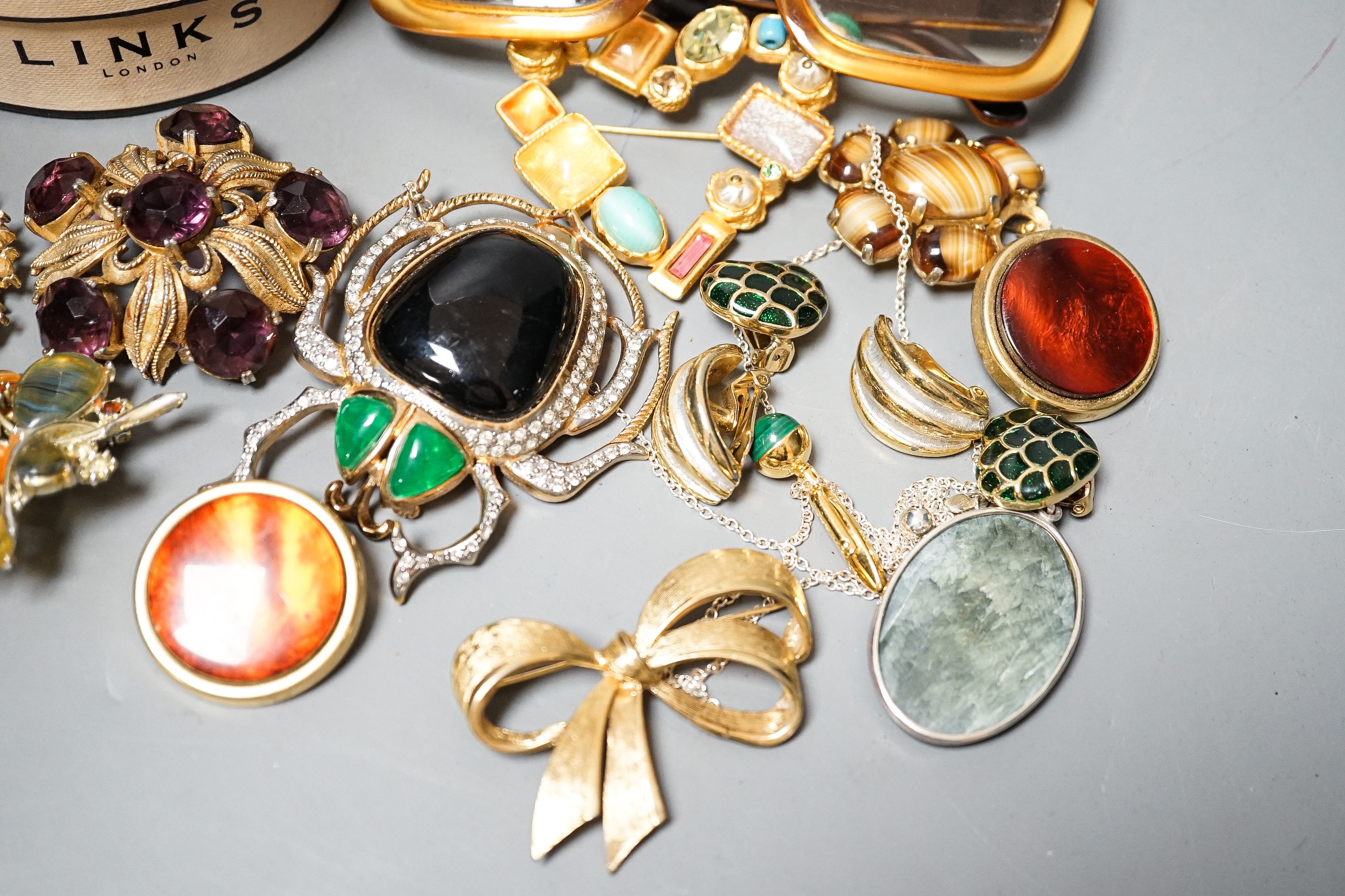 A mixed lot of costume jewellery including Christian Lacroix, scarab brooch stamped Valentino, Dior glasses etc.
